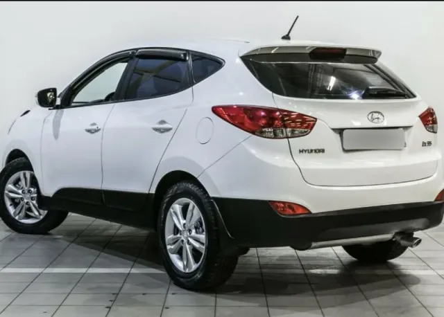Hyundai ix35, I — фото 15
